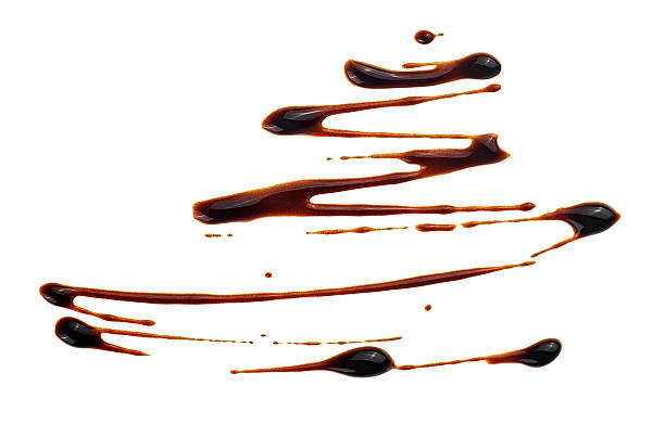 istock Melted chocolate swirl isolated on a white background, top view. Hot chocolate, decorative line. 2214115931