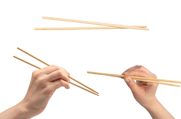 istock Sushi chopsticks isolated on a white background. 2214118654