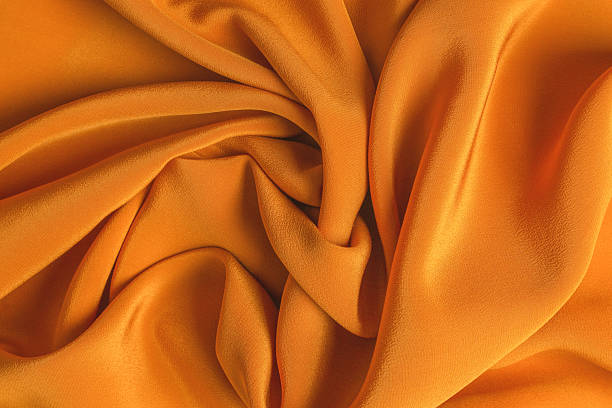istock Golden silk or satin luxury fabric texture can use as abstract background. 2214118658