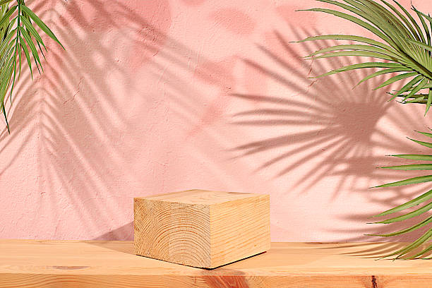 istock Premium empty wooden birch podium with shadows on sunny elegant background,Minimal abstract backdrop for cosmetic products presentation,beauty aesthetics,template for design,summer party concept 2214119123