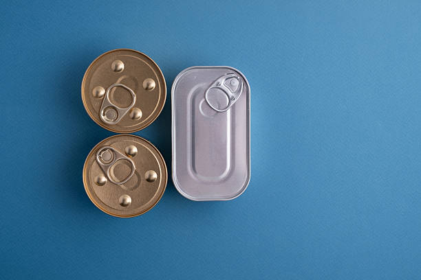 Unopened tin cans with various preserves. Fast food concept