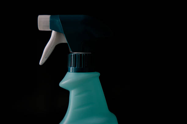 Close up of the upper part of a spray bottle