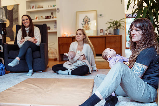 istock Group of women with babies attending educational support group for new parents 2214122266