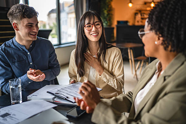 istock young entrepreneurs happy and grateful for signing contract 2214123707