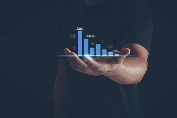 istock Cost management and quality control, business strategy project concept. Businessman opens his hand with quality control growth graph and cost reduction, control budget cost and improvement. 2214125919