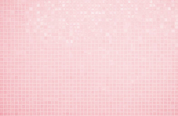 istock Pink tile wall chequered background bathroom floor texture. Ceramic wall and floor tiles mosaic background in bathroom and kitchen clean. Pool design pattern geometric with grid wallpaper decoration. 2214138554