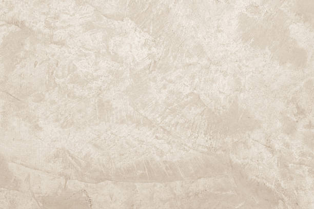 istock Colour old concrete wall texture background. Close up retro plain cream color cement wall background texture. Design paper vintage parchment element. 2214138564