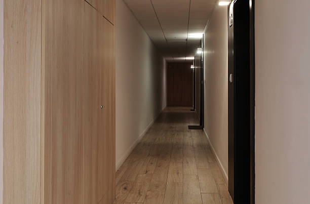 istock modern hallway with wooden floor and light walls 2214138634