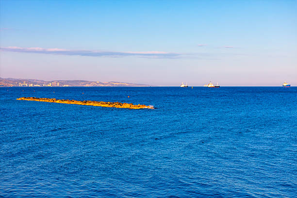 istock Calm blue sea stretches toward horizon 2214141025