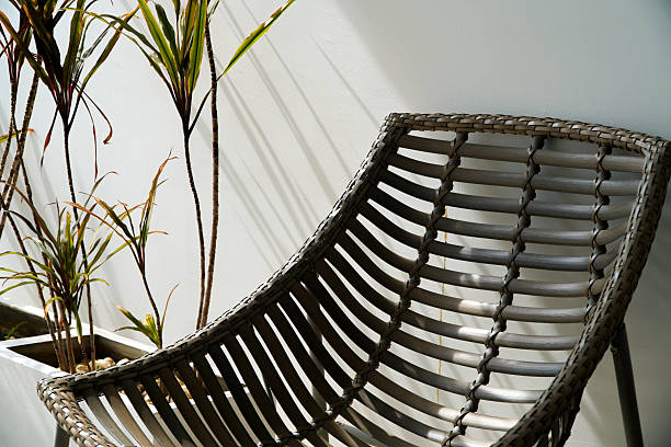 istock rattan chair on white wall background, interior design concept. 2214150765