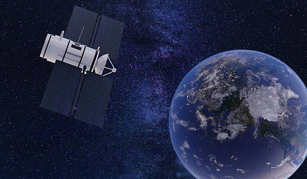 istock Satellite floating in orbit of the earth. Sci-fi style. Remote communication. Background, technology. 3D illustration. 2214158115