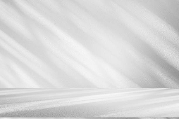 istock Wall interior background, studio and backdrops show products.with shadow from window color white . background for text insertion and presentation product 2214162342