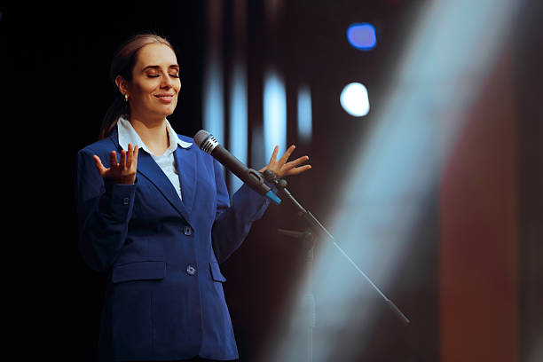 istock Motivational Speaker Talking on a Stage at public Convention 2214167526