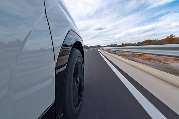 istock A car driving fast on the open road 2214167660