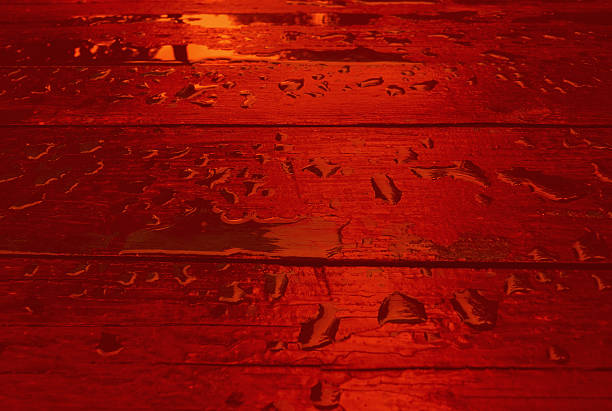 Wooden Boards Painted in Dark Red Loft Style with Water Drops