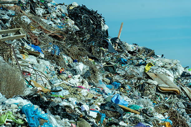istock Overfilled landfill site showcasing discarded trash, plastic waste, and garbage creating an environmental concern pollution problem. 2214173573