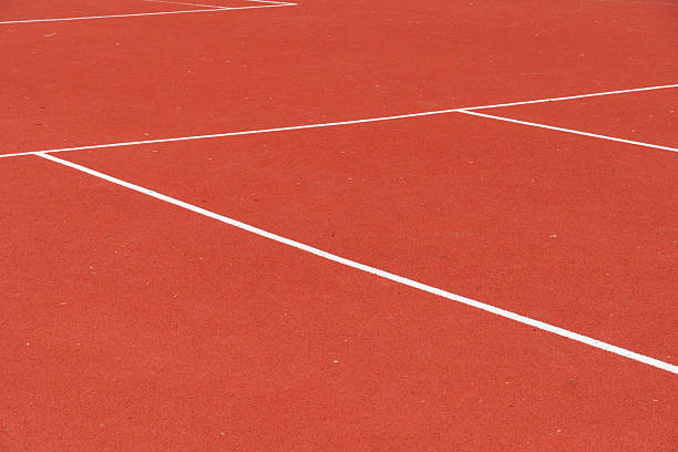 istock Geometric Pattern: Red Surface with White Lines Forming Court Layout for Sporting Events, Recreation & Exercise 2214173630