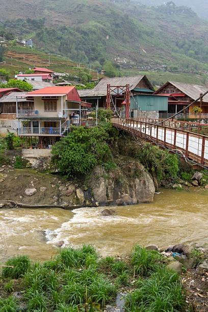 istock Bridge and village in Ta Van, Vietnam 2214177121