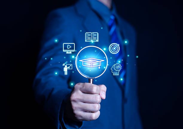 istock Man holding magnifying glass on virtual screen. Online education concept. Choose the correct answer. Online digital technology concept. Internet learning training course. Digital 2214179735