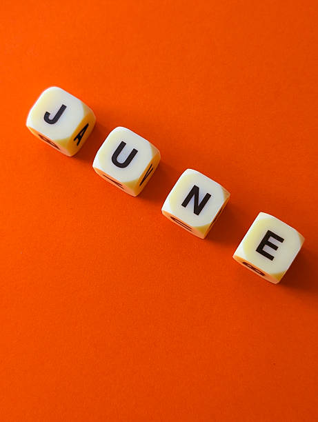 istock word “june” formed by letter cubes on an orange background 2214182527
