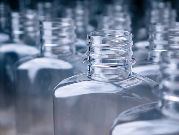 istock Row of plastic PET Bottles Production Line  Ready for Bottling. 2214182837