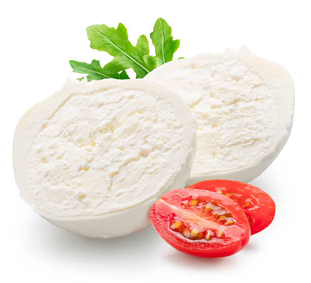 istock Cut on half burrata cheese with stracciatella and clotted cream inside and fresh arugula leaves and tomatoes on white background. File clipping path. 2214185444