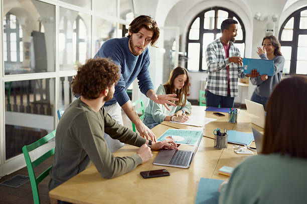 istock Creative colleagues working on a meeting at casual office. 2214187775