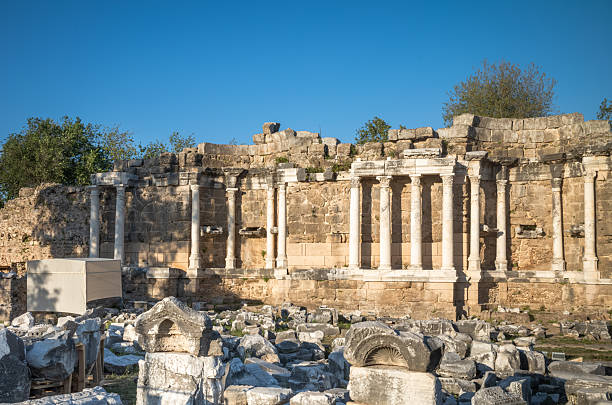 Part of the ruins of the Monumental Fountain (Nymphaeum) within the ancient Roman city at Side in Turkey.The relic is being gradually restored.