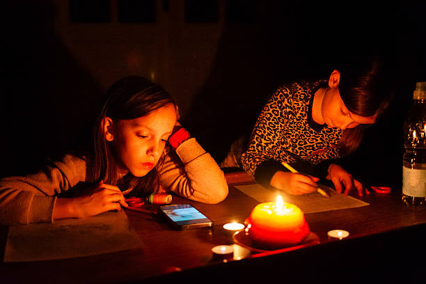 istock Children draw during a power outage 2214188865