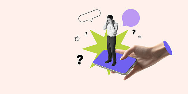 istock Man standing on phone platform holds head in frustration as abstract icons suggest overload of questions. 2214189282