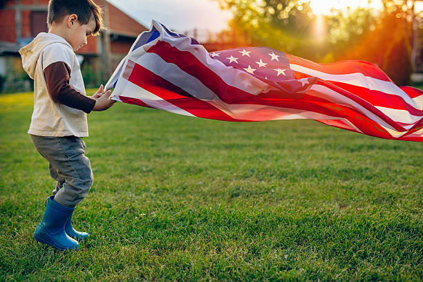 istock Happy child celebrating Independence Day 2214189518