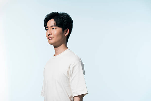 A Japanese Man In His 20s In The Summer Sunshine Stock Photo