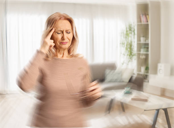 istock Woman suffering from a headache and feeling dizzy 2214191793