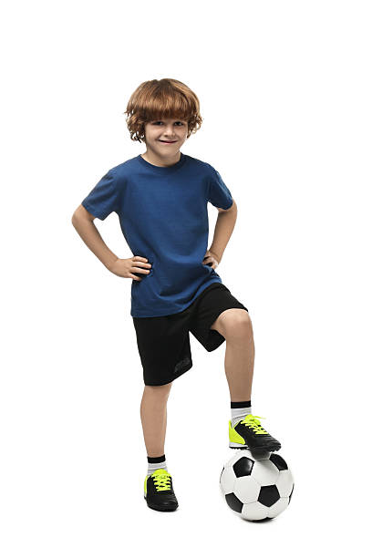 istock Little boy with soccer ball on white background 2214192104