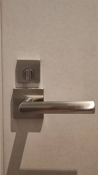 istock Modern stainless steel door handle texture closeup view 2214193078