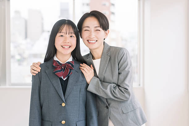 Japanese female junior high school students and teachers in uniform