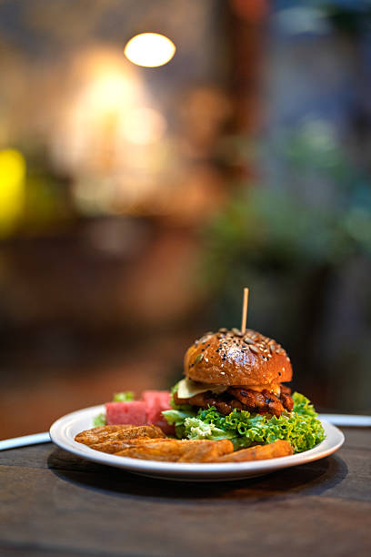Gourmet Burger with Wedges and Watermelon Slices