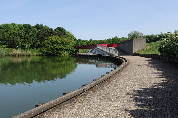 istock Body of water bordered by a pedestrian path 2214200596