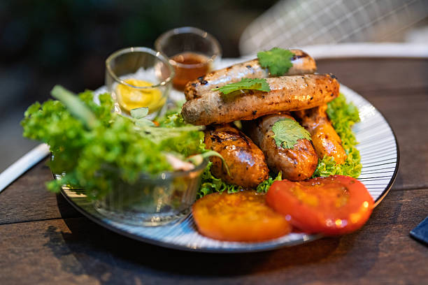 Enjoying a healthy and flavorful meal of roasted potatoes with pork and a refreshing salad