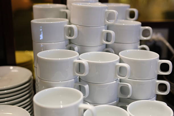 istock Neatly stacked white cups add a cozy vibe 2214201240