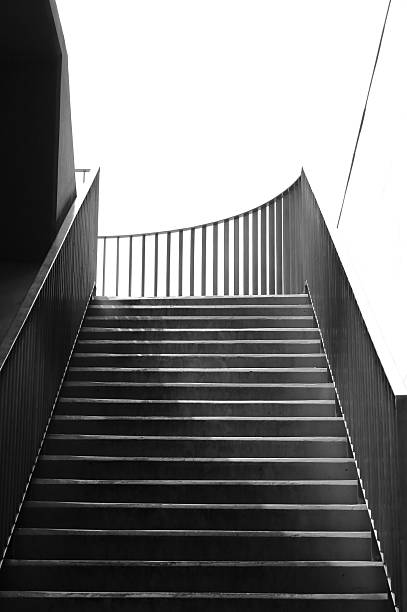 istock Steel stairs with light and shadow in evening 2214201833