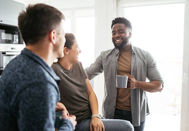 istock A group of diverse friends enjoying a conversation and coffee 2214201912