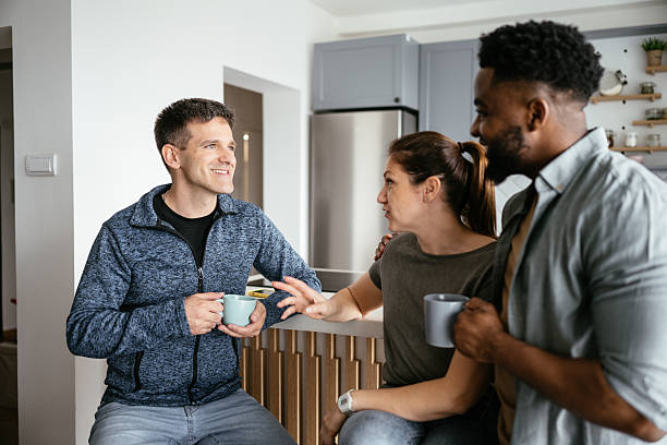 istock A group of diverse friends enjoying a conversation and coffee 2214201938