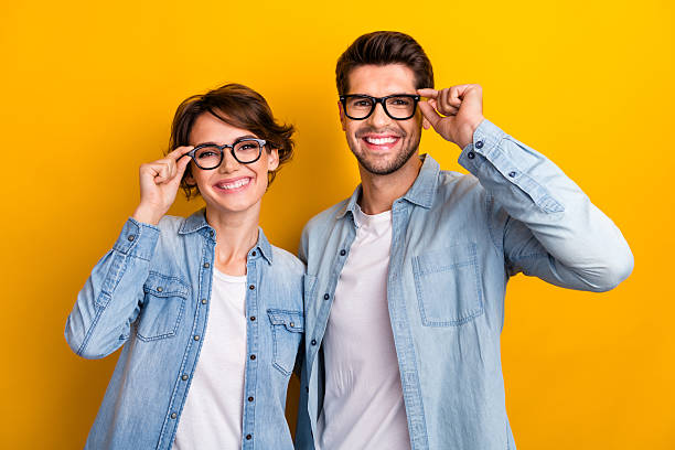 istock Photo of two agents business people touch eyeglasses eyewear decide start up solution isolated bright color background 2214207123