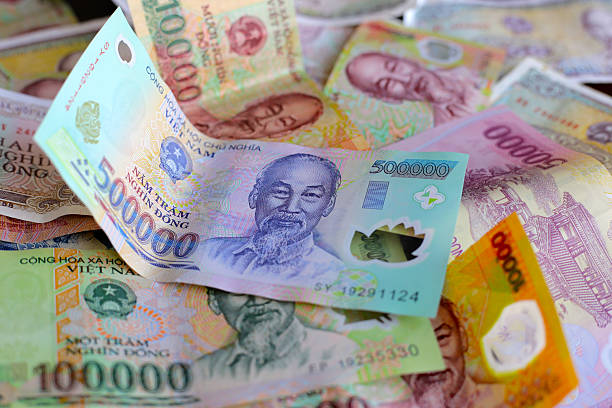 istock Vietnamese dong banknotes. Money concept 2214209588