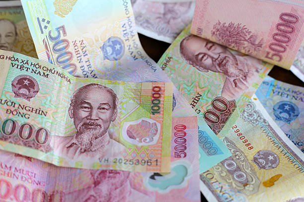 istock Vietnamese dong banknotes. Money concept 2214210538