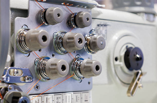 istock Industrial sewing machine close-up 2214219377