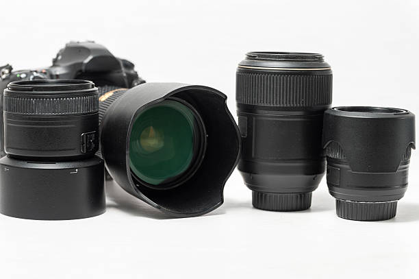 istock Camera with four black lenses on white background. 2214221015