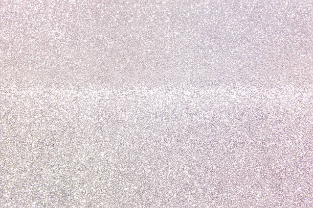 istock Shiny light pearlescent background made of fine glitter dust. Light festive background for wedding, 2214221657