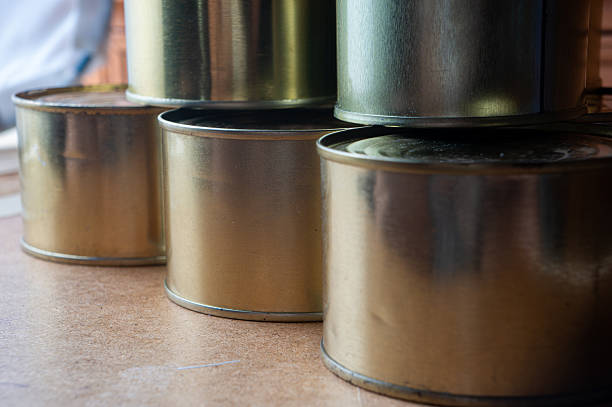 istock Round tin cans with food on the surface 2214224587